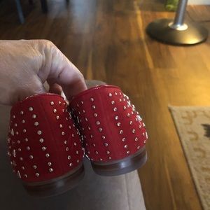 Red BCBG embellished flats.